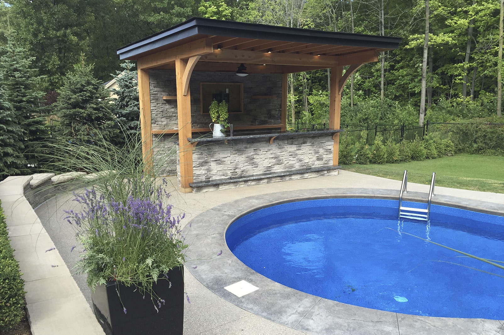 Exquisite Stone Bar & Pool Deck Natural Landscape Group