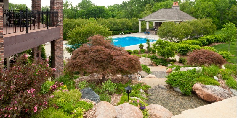 landscaping a backyard with a slope