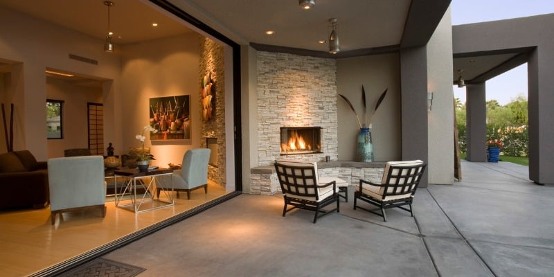 Outdoor fireplace with chairs