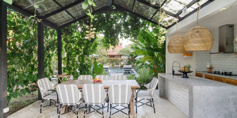 outdoor kitchen with dining set